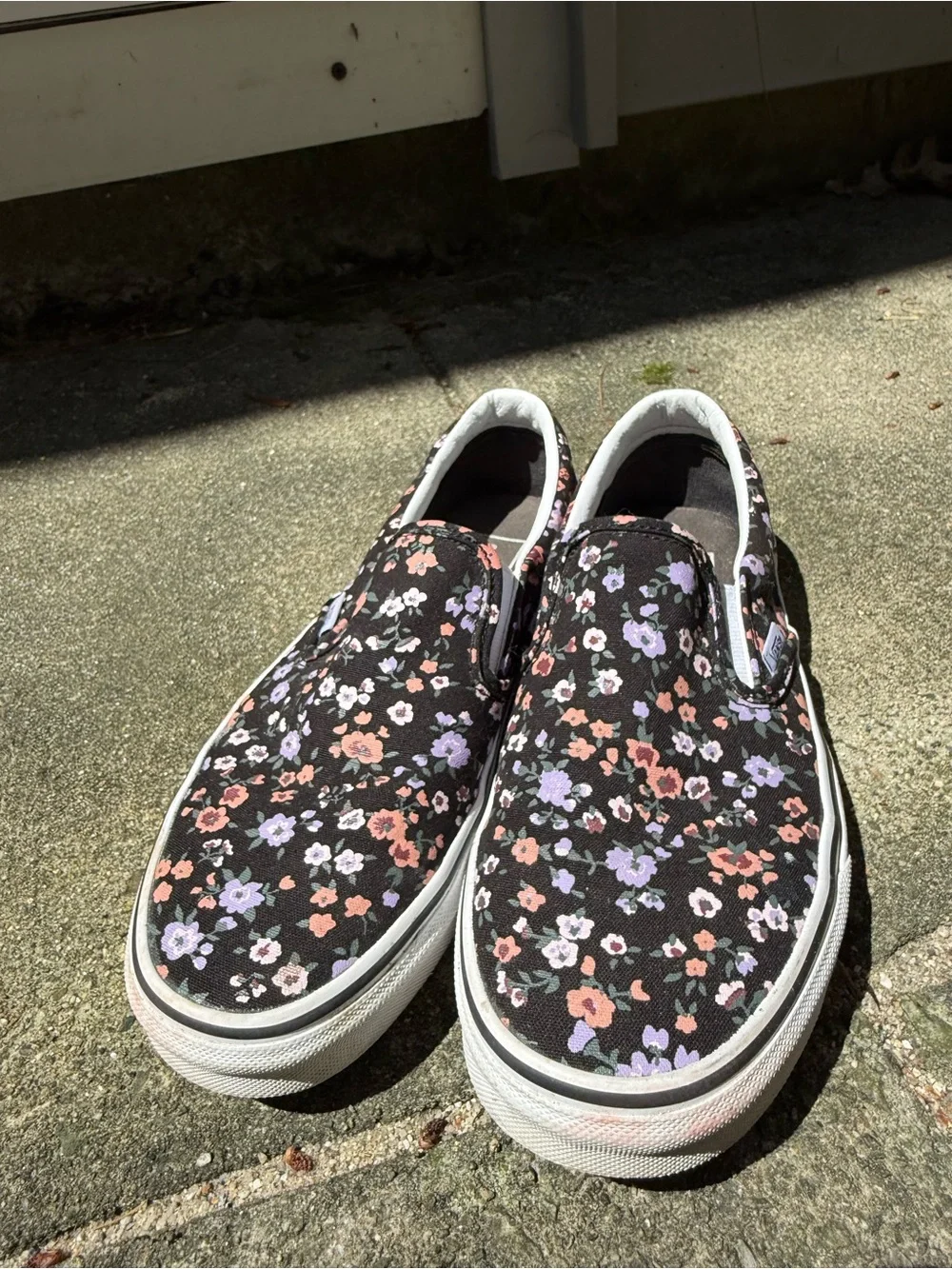 Vans Slip-On Floral Sneakers in Black with Pink & Lavender Flowers